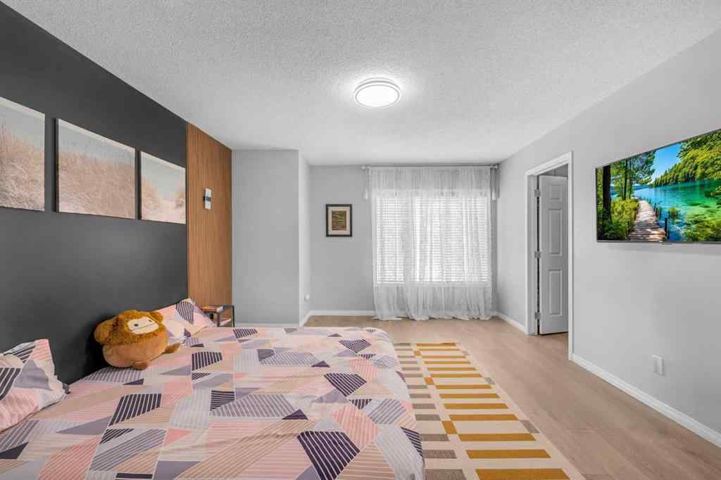 MLS® A2259387 - 233 Saddlecrest Way NE in Saddle Ridge Calgary, Residential