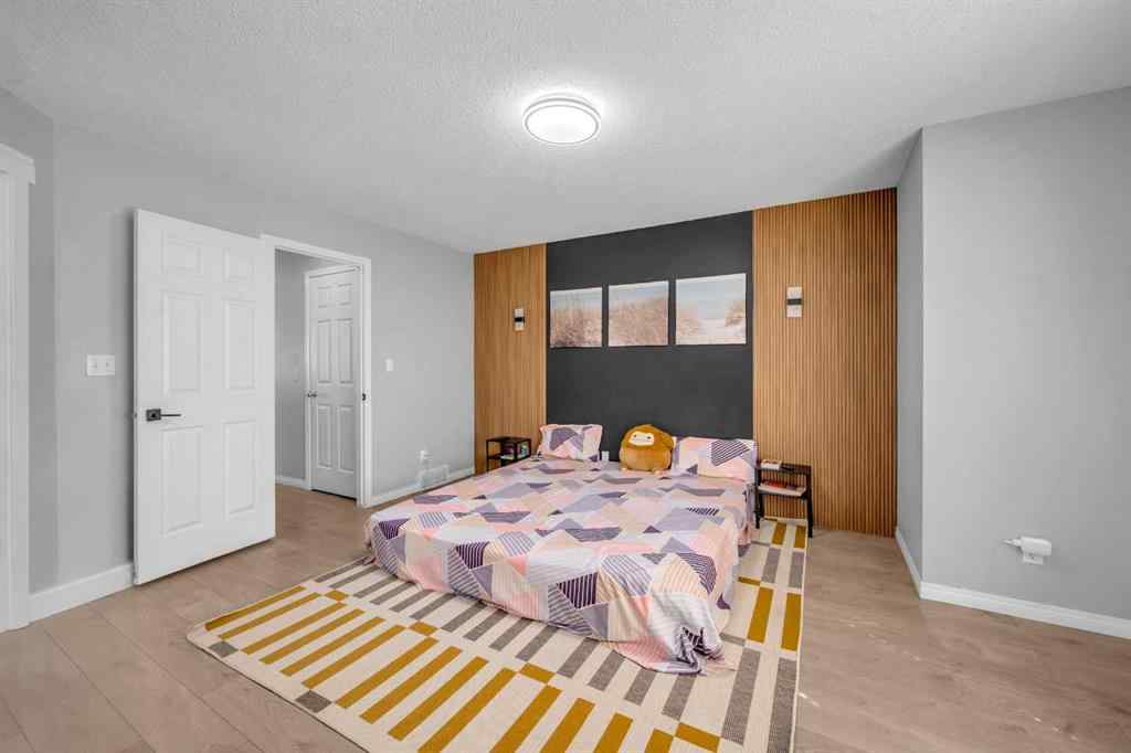 MLS® A2259387 - 233 Saddlecrest Way NE in Saddle Ridge Calgary, Residential