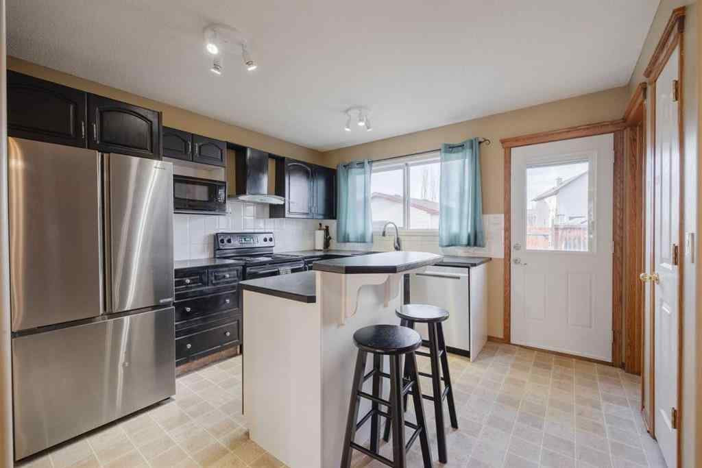 MLS&reg; # A2259407 - 276 Cramond Close SE in Cranston Calgary, Residential Open Houses