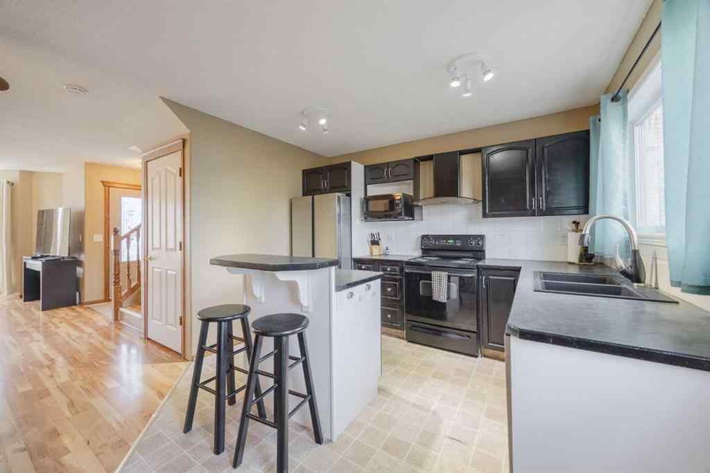 MLS&reg; # A2259407 - 276 Cramond Close SE in Cranston Calgary, Residential Open Houses
