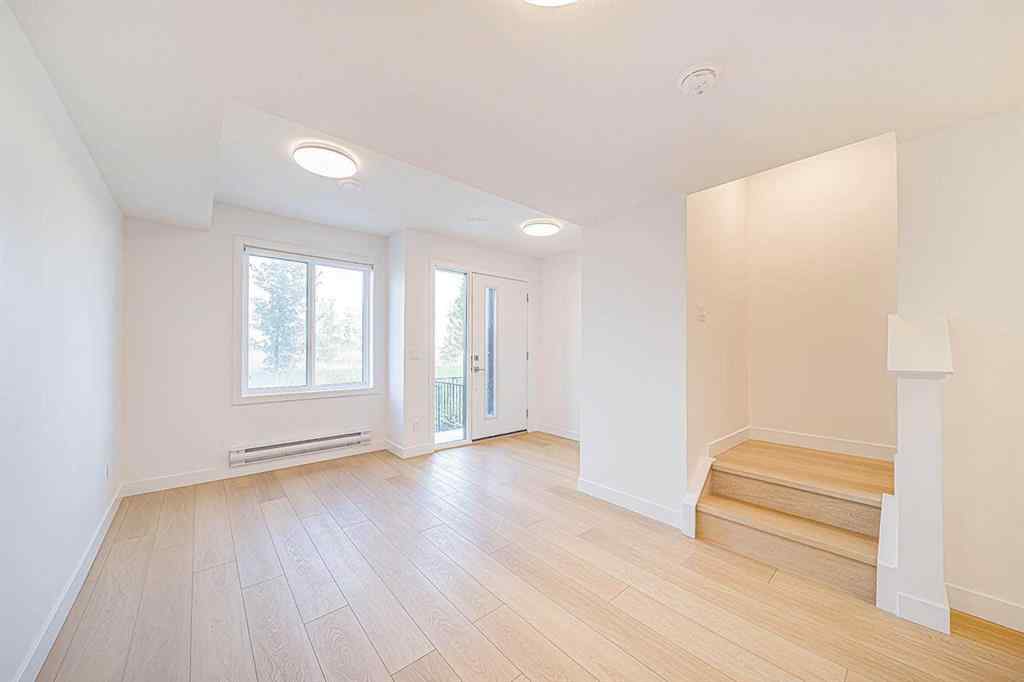 MLS® A2259416 - Unit #105 8535 19 Avenue SE in Belvedere Calgary, Residential