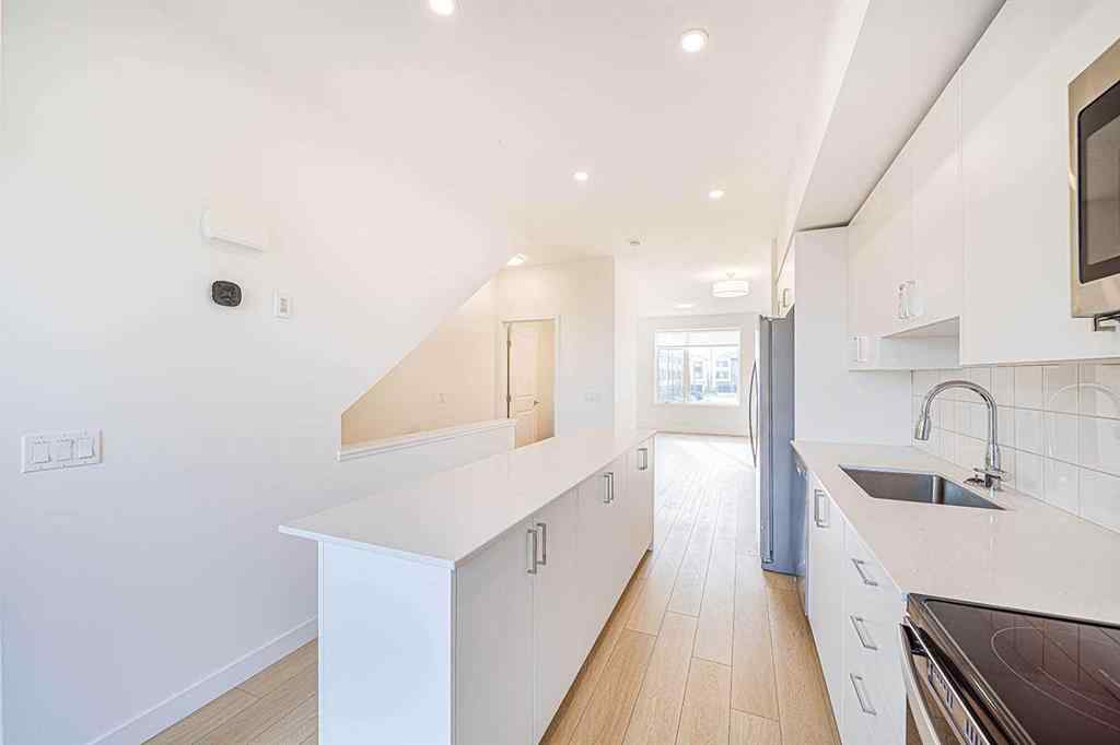 MLS® A2259416 - Unit #105 8535 19 Avenue SE in Belvedere Calgary, Residential