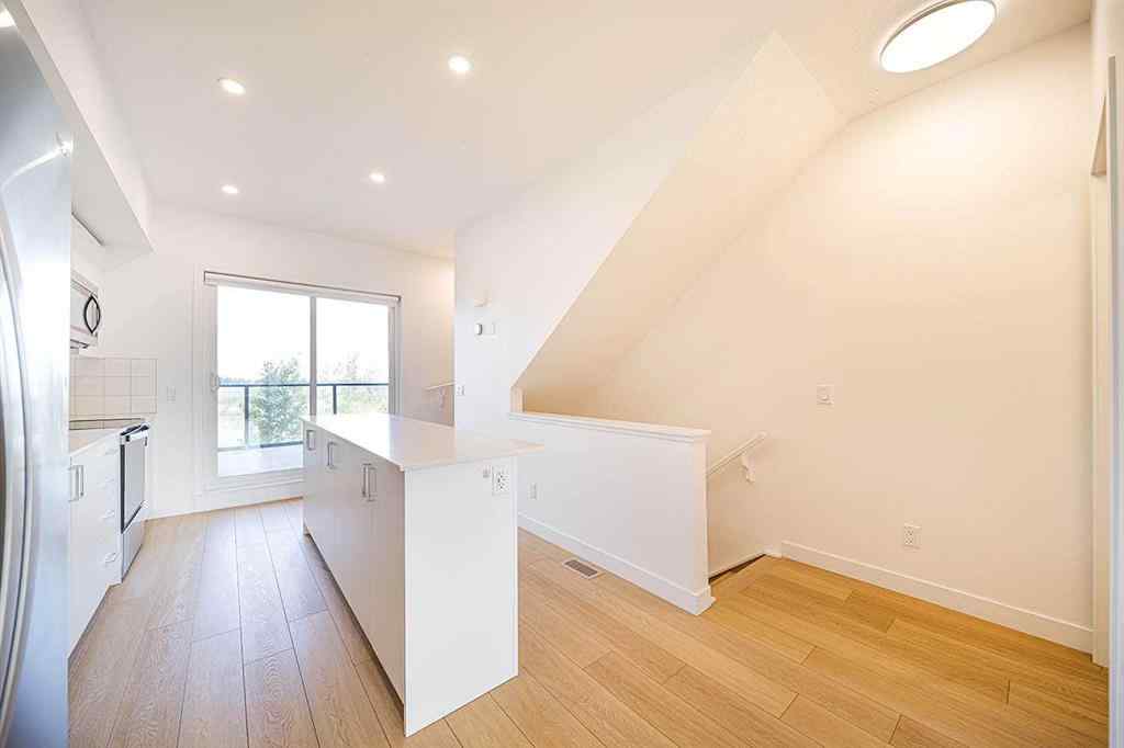 MLS® A2259416 - Unit #105 8535 19 Avenue SE in Belvedere Calgary, Residential