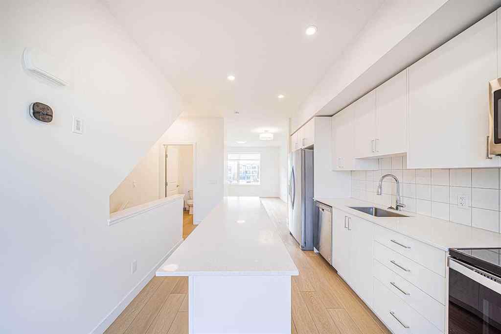 MLS® A2259416 - Unit #105 8535 19 Avenue SE in Belvedere Calgary, Residential