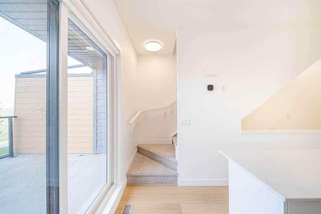 MLS® A2259416 - Unit #105 8535 19 Avenue SE in Belvedere Calgary, Residential