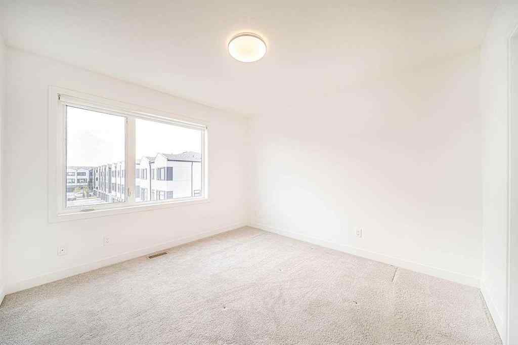 MLS® A2259416 - Unit #105 8535 19 Avenue SE in Belvedere Calgary, Residential