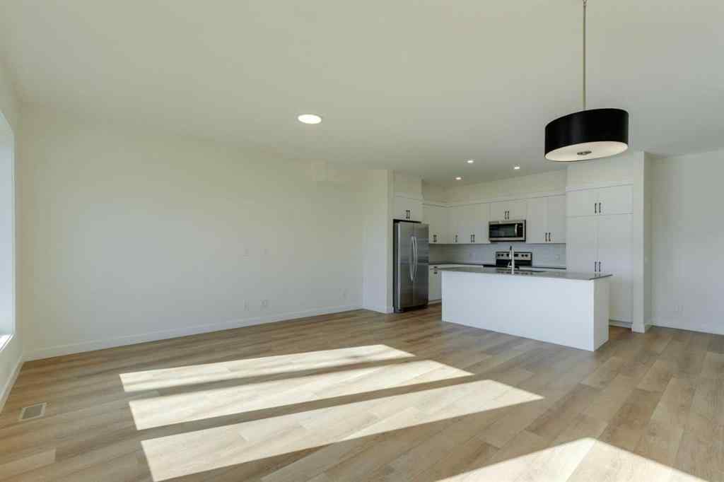 MLS® A2259436 - Unit #3 8511 21 Avenue SE in Belvedere Calgary, Residential