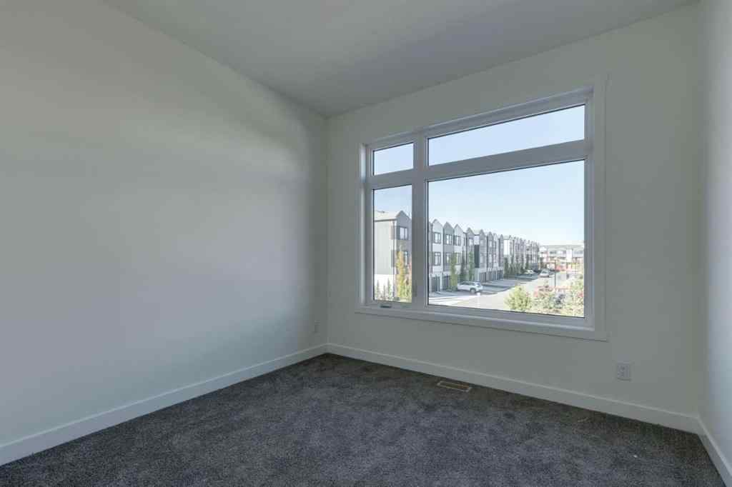 MLS® A2259436 - Unit #3 8511 21 Avenue SE in Belvedere Calgary, Residential