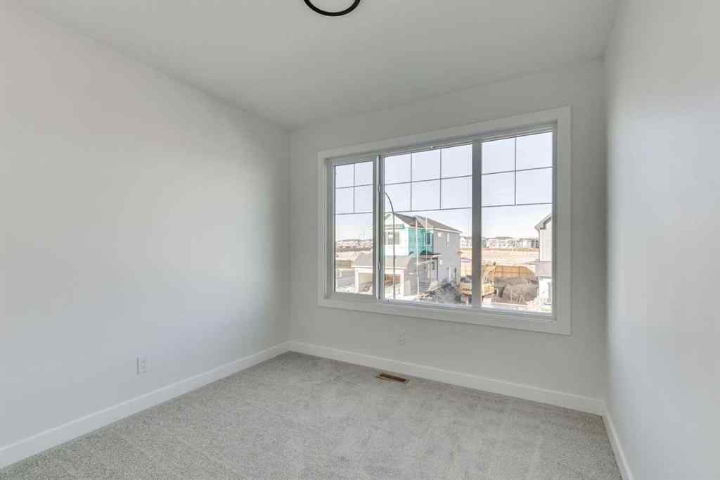 MLS® A2259468 - 600 Buffaloberry Manor SE in Ricardo Ranch Calgary, Residential