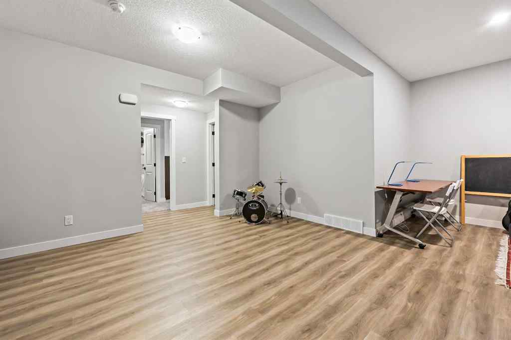 MLS® A2259480 - 34 Coach Ridge Point SW in Coach Hill Calgary, Residential