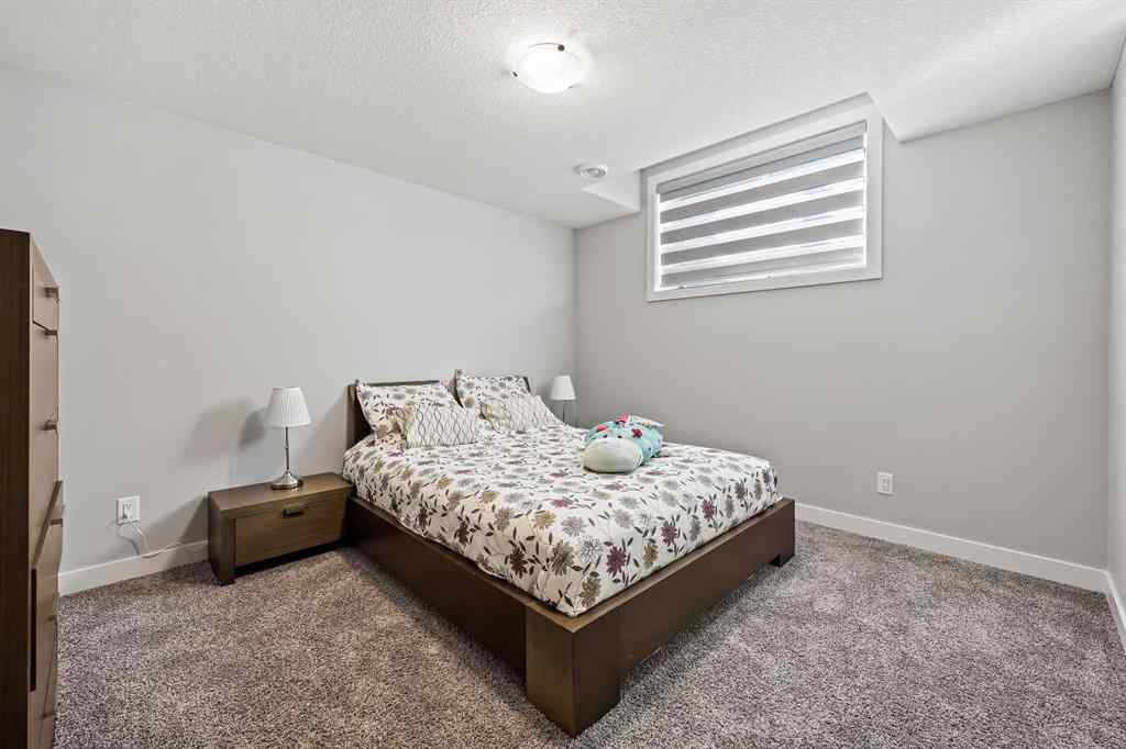 MLS® A2259480 - 34 Coach Ridge Point SW in Coach Hill Calgary, Residential