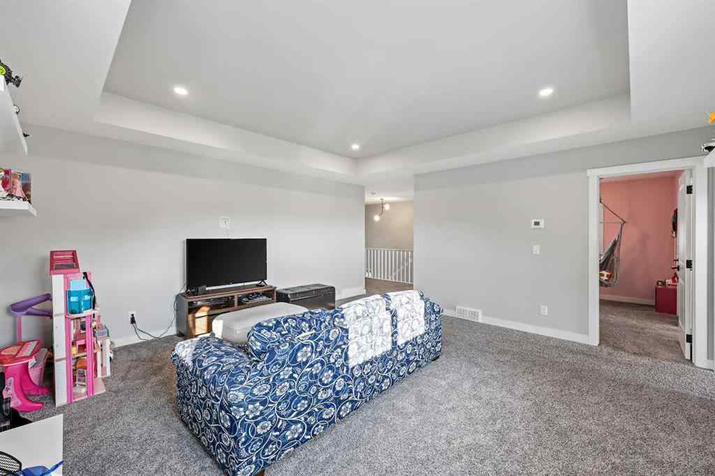 MLS® A2259480 - 34 Coach Ridge Point SW in Coach Hill Calgary, Residential
