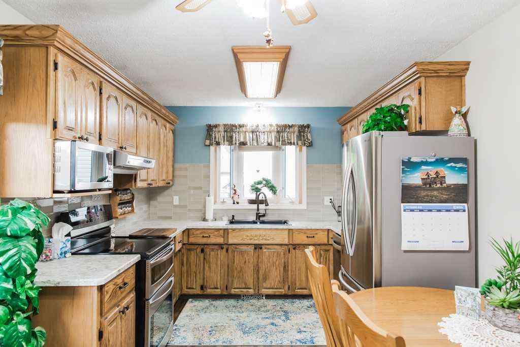 MLS® A2259493 - 9905 70 Avenue  in South Patterson Place Grande Prairie, Residential