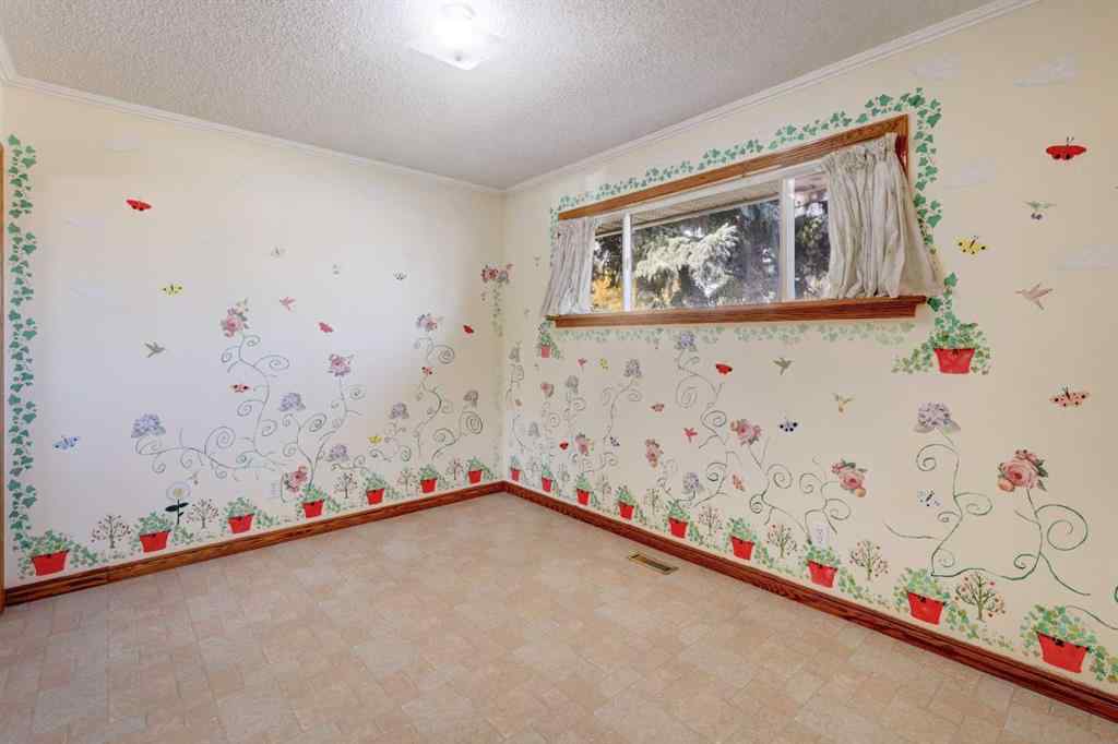 MLS® A2259528 - 8127 43 Avenue NW in Bowness Calgary, Residential