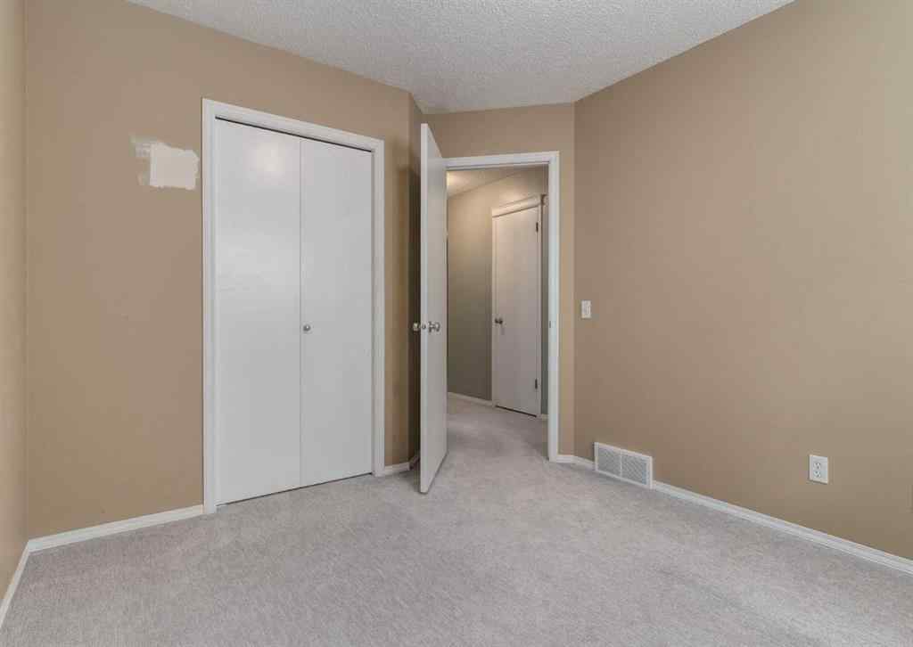 MLS® A2259548 - 137 Tuscany Springs Way NW in Tuscany Calgary, Residential