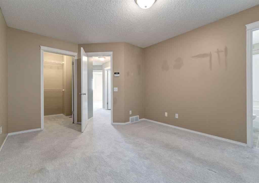 MLS® A2259548 - 137 Tuscany Springs Way NW in Tuscany Calgary, Residential