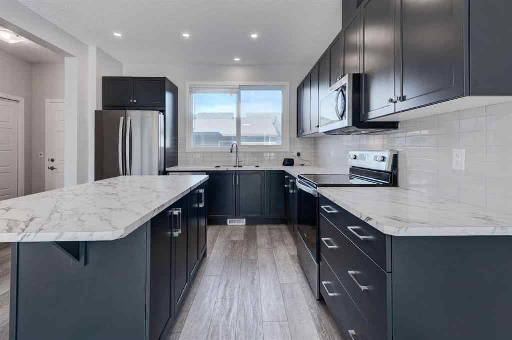 MLS® A2259550 - 362 Wolf Creek Manor SE in Wolf Willow Calgary, Residential