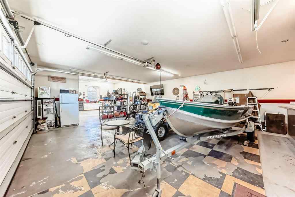 MLS® A2259560 - 716 West Chestermere Drive  in West Chestermere Drive Chestermere, Residential