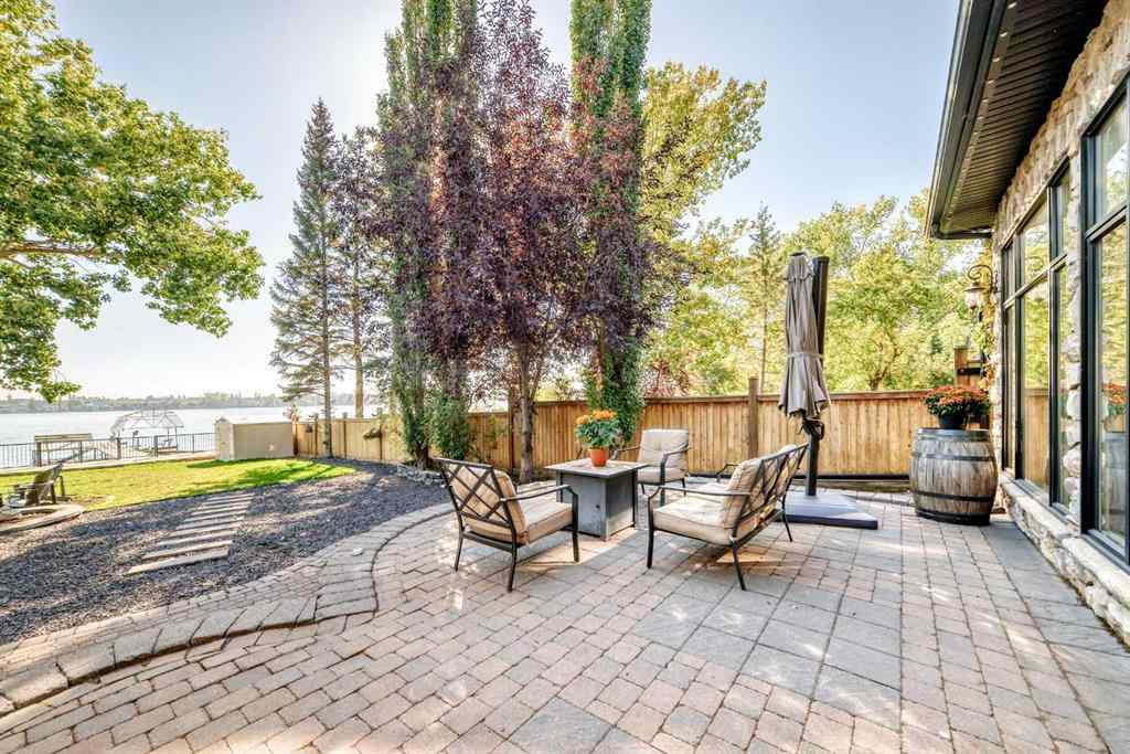 MLS® A2259560 - 716 West Chestermere Drive  in West Chestermere Drive Chestermere, Residential