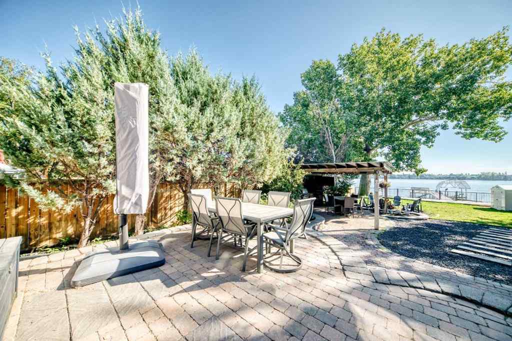 MLS® A2259560 - 716 West Chestermere Drive  in West Chestermere Drive Chestermere, Residential