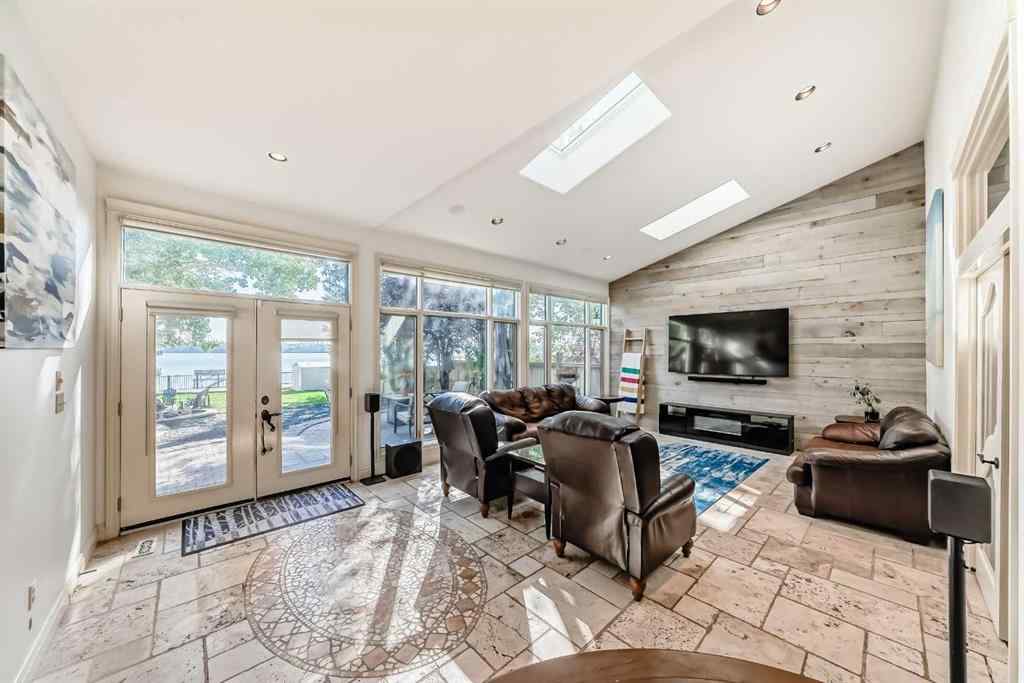 MLS® A2259560 - 716 West Chestermere Drive  in West Chestermere Drive Chestermere, Residential