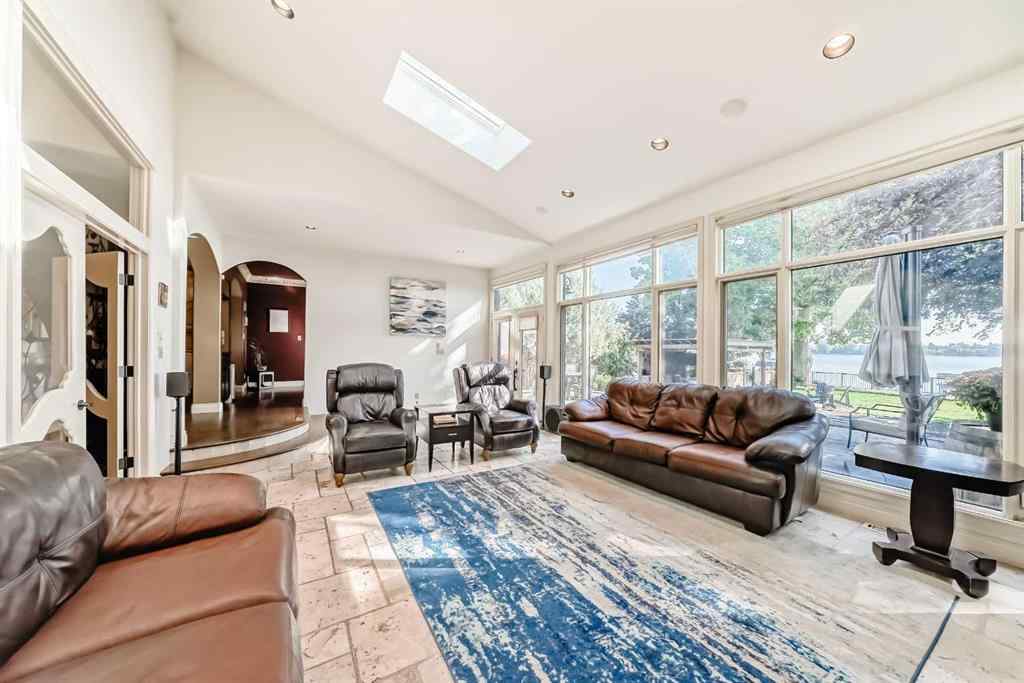 MLS® A2259560 - 716 West Chestermere Drive  in West Chestermere Drive Chestermere, Residential