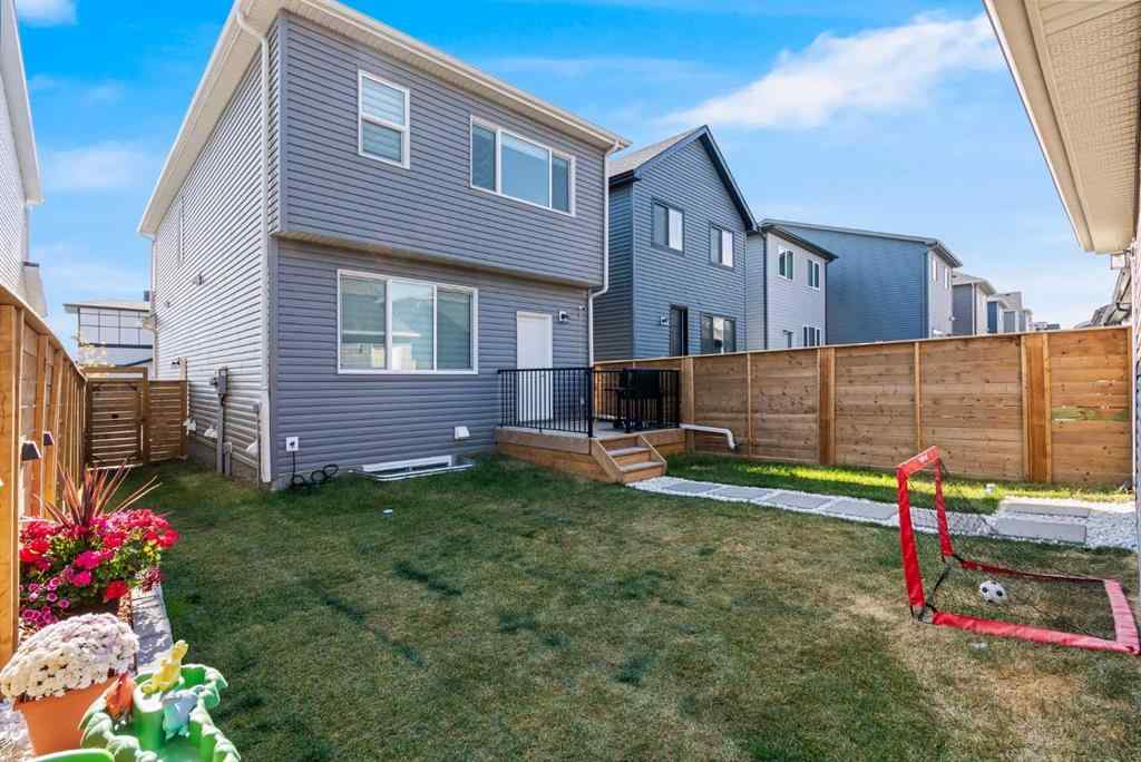 MLS® A2259561 - 119 Herron Street NE in Livingston Calgary, Residential