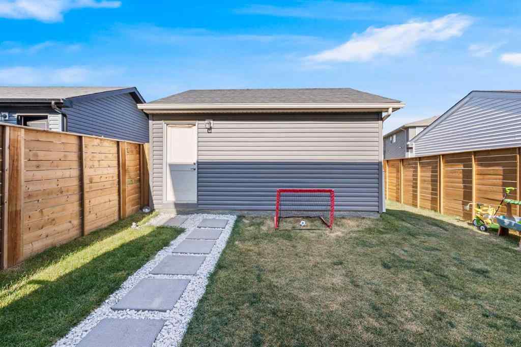 MLS® A2259561 - 119 Herron Street NE in Livingston Calgary, Residential