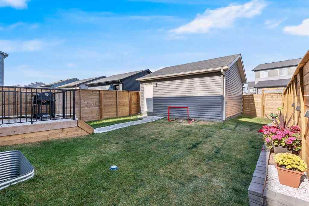 MLS® A2259561 - 119 Herron Street NE in Livingston Calgary, Residential