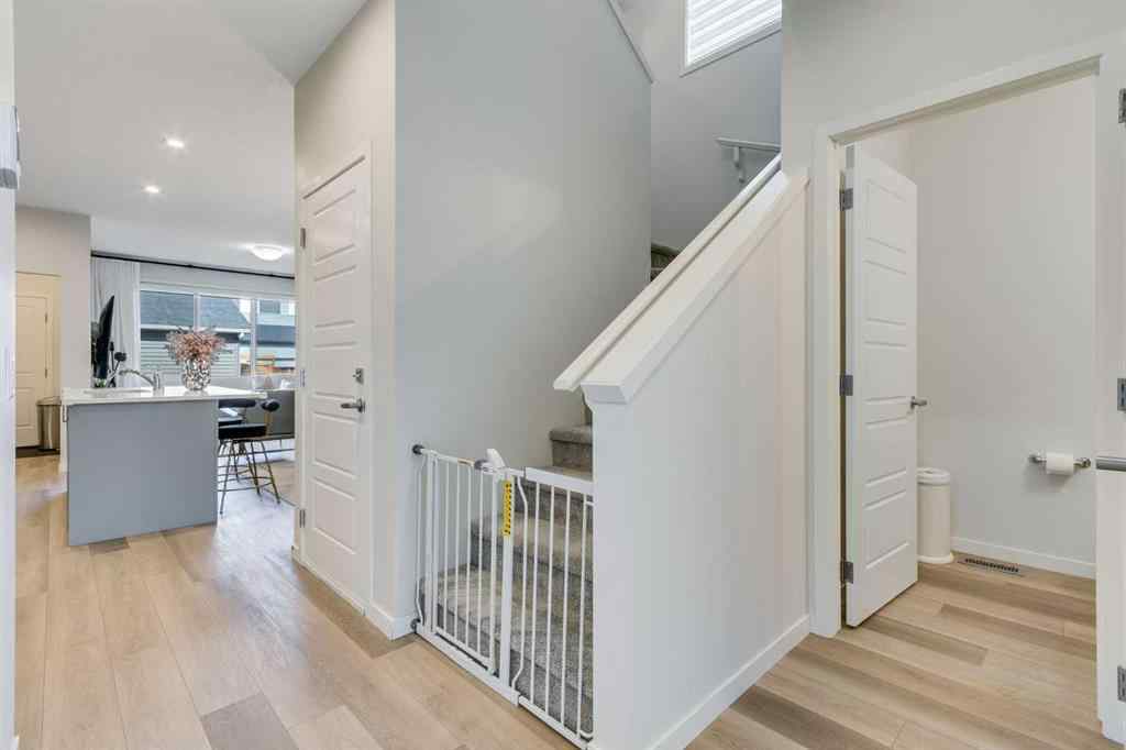 MLS® A2259561 - 119 Herron Street NE in Livingston Calgary, Residential