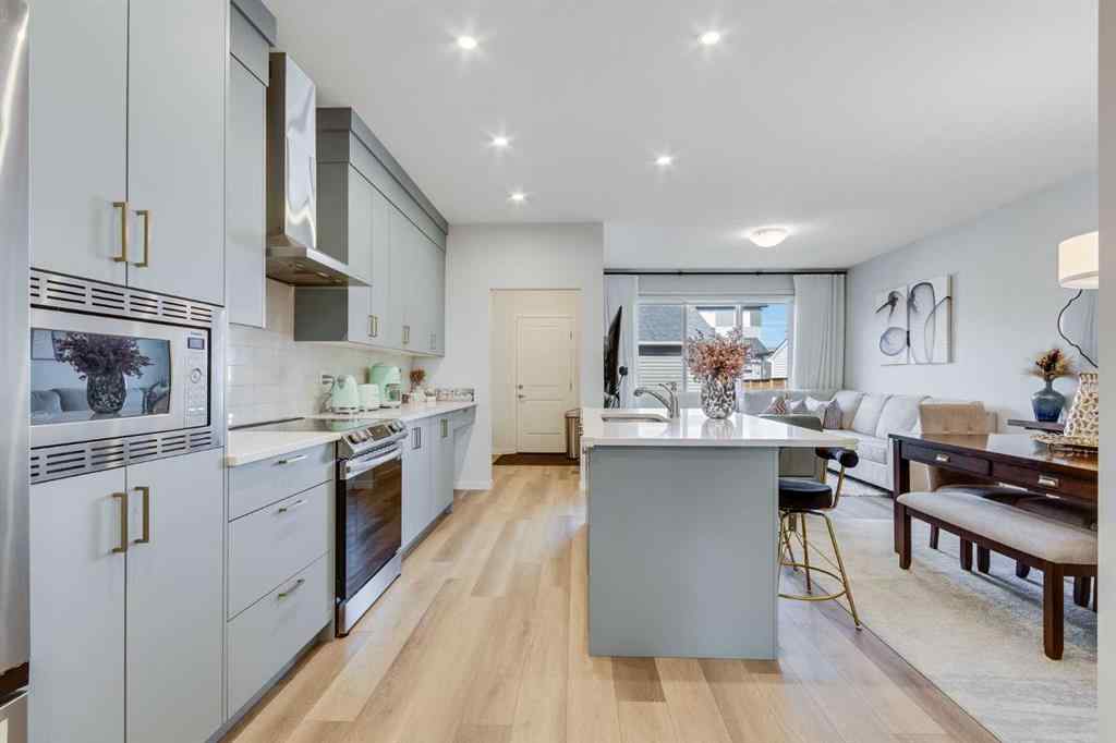 MLS® A2259561 - 119 Herron Street NE in Livingston Calgary, Residential