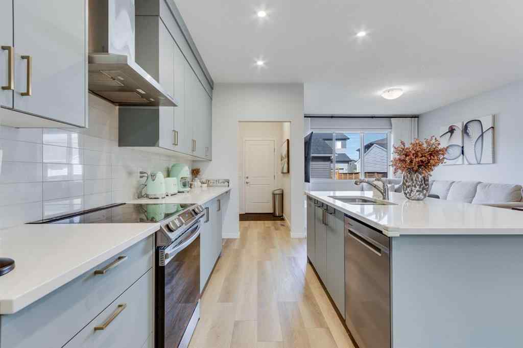 MLS® A2259561 - 119 Herron Street NE in Livingston Calgary, Residential