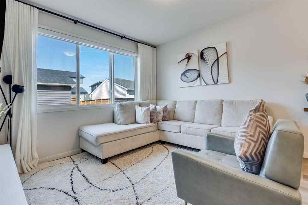 MLS® A2259561 - 119 Herron Street NE in Livingston Calgary, Residential