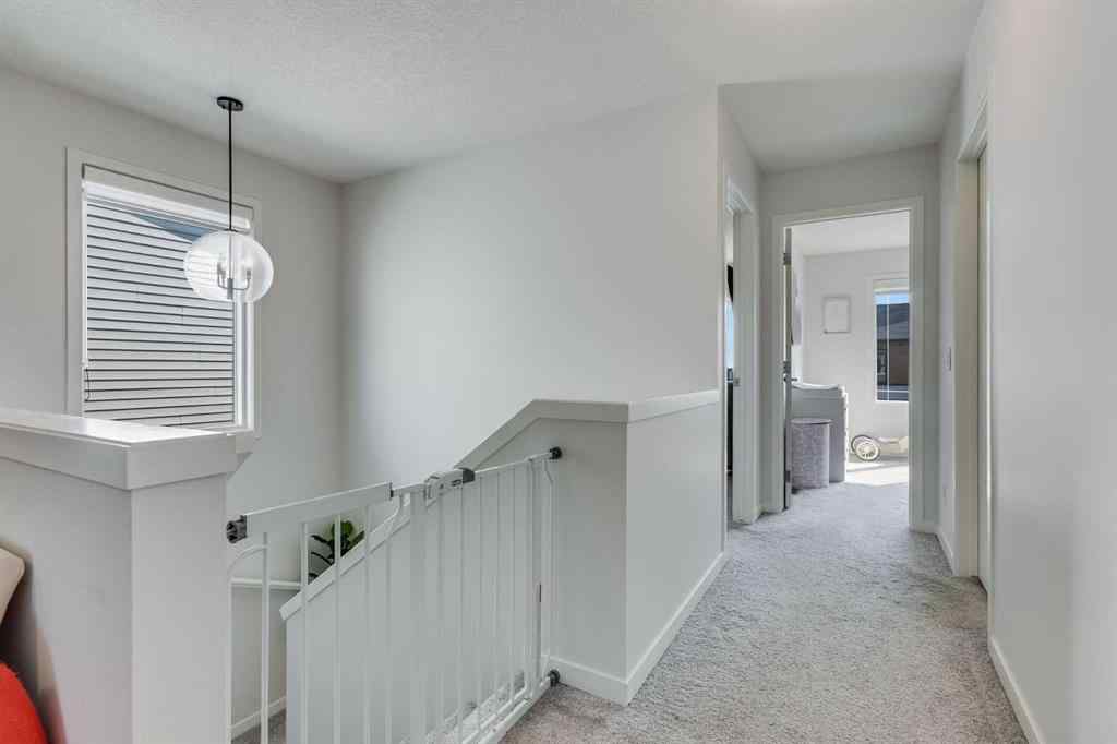 MLS® A2259561 - 119 Herron Street NE in Livingston Calgary, Residential