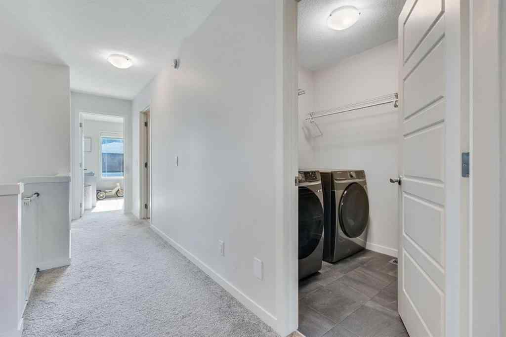 MLS® A2259561 - 119 Herron Street NE in Livingston Calgary, Residential