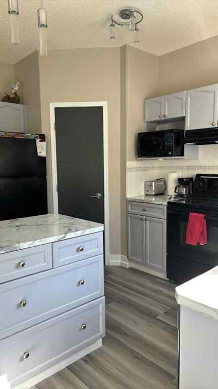 MLS® A2259564 - 148 Stonegate Crescent NW in Stonegate Airdrie, Residential