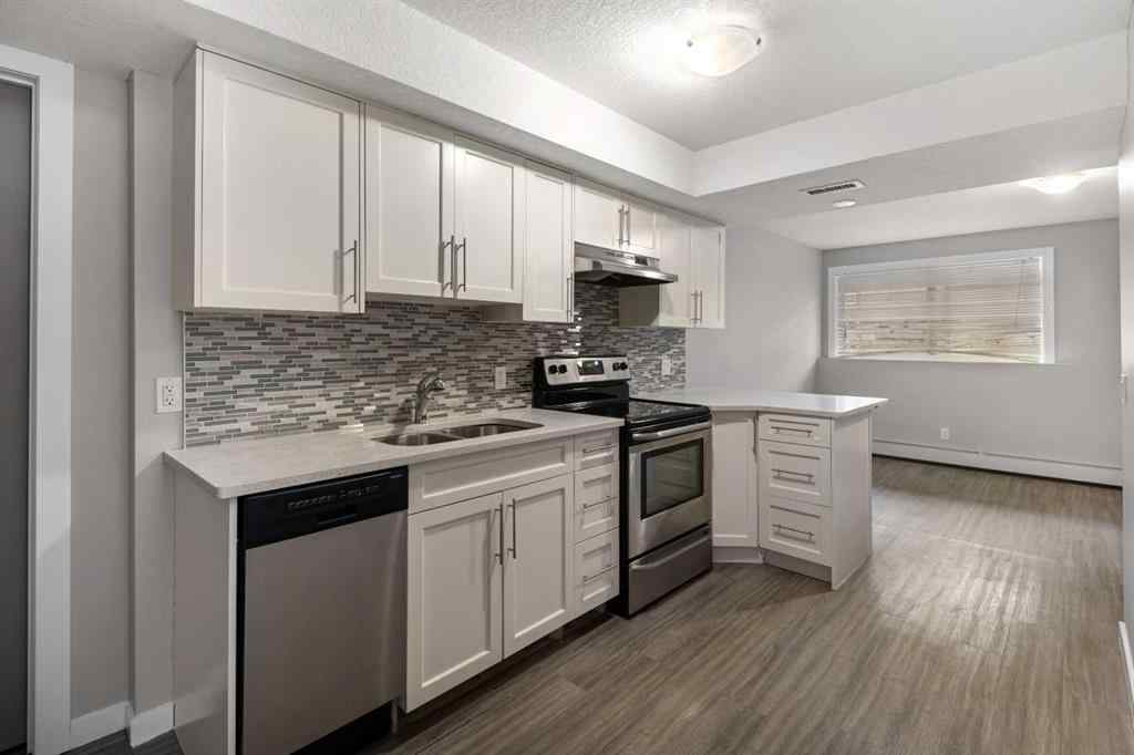 MLS® A2259633 - Unit #1 1820 9 Street SW in Lower Mount Royal Calgary, Residential