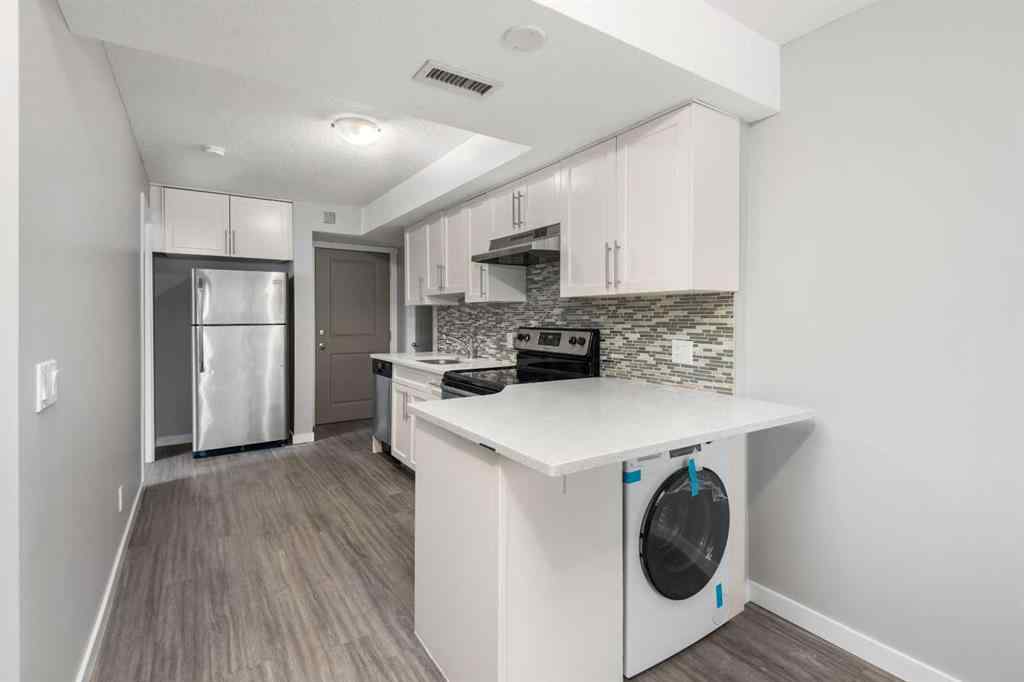 MLS® A2259633 - Unit #1 1820 9 Street SW in Lower Mount Royal Calgary, Residential