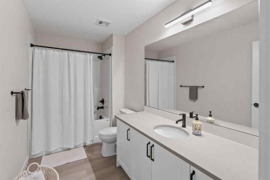 MLS® A2259642 - Unit #204 201 Cooperswood Green SW in Coopers Crossing Airdrie, Residential