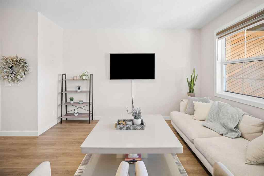 MLS® A2259642 - Unit #204 201 Cooperswood Green SW in Coopers Crossing Airdrie, Residential