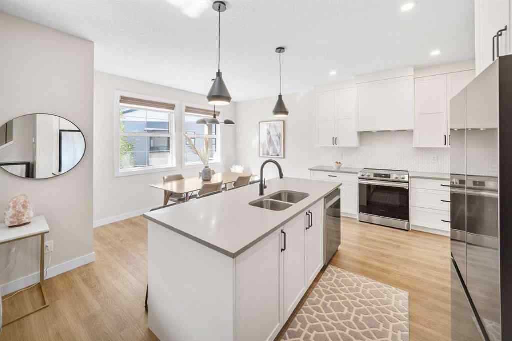 MLS® A2259642 - Unit #204 201 Cooperswood Green SW in Coopers Crossing Airdrie, Residential