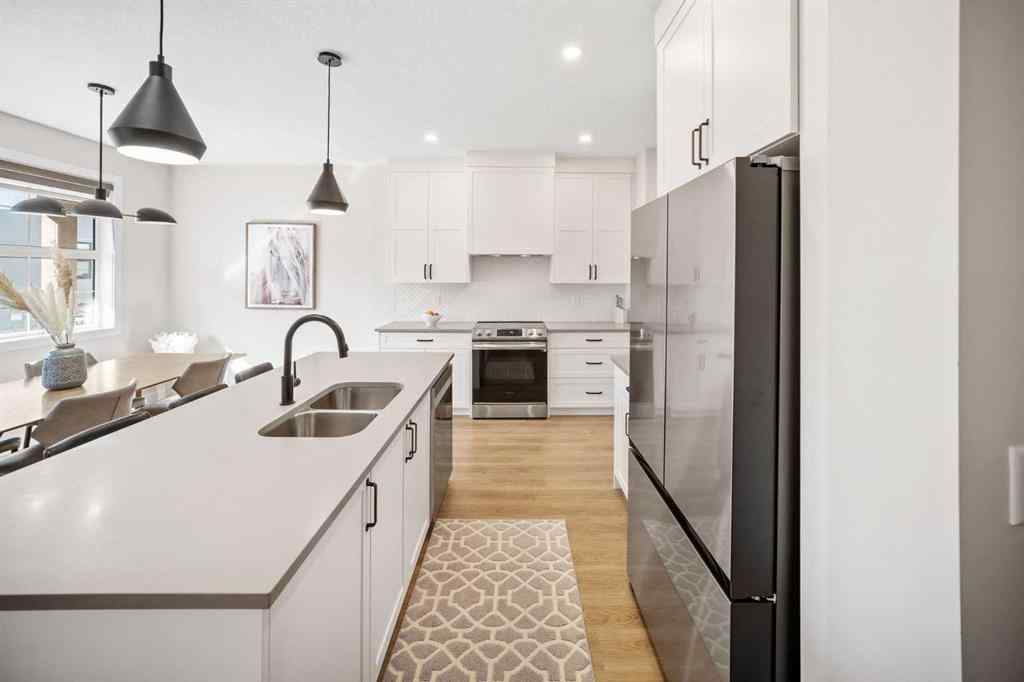 MLS® A2259642 - Unit #204 201 Cooperswood Green SW in Coopers Crossing Airdrie, Residential