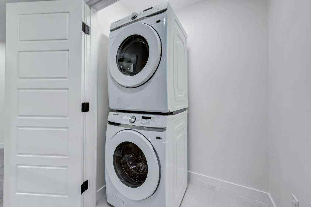 MLS® A2259645 - 891 Langholm Drive SE in Lanark Airdrie, Residential