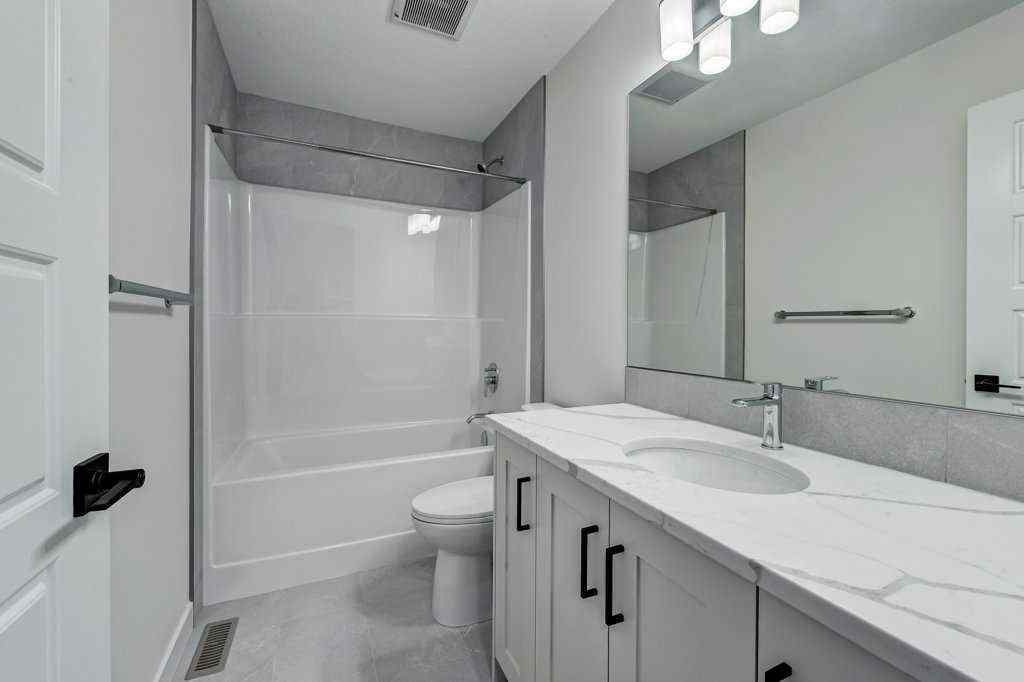 MLS® A2259645 - 891 Langholm Drive SE in Lanark Airdrie, Residential