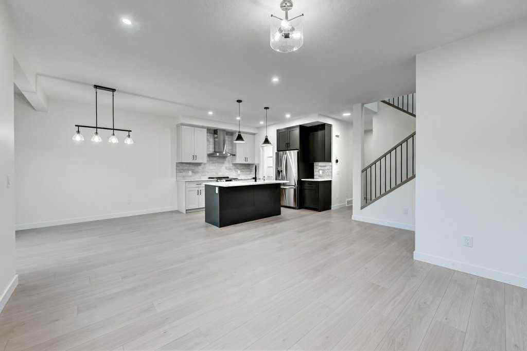 MLS® A2259645 - 891 Langholm Drive SE in Lanark Airdrie, Residential