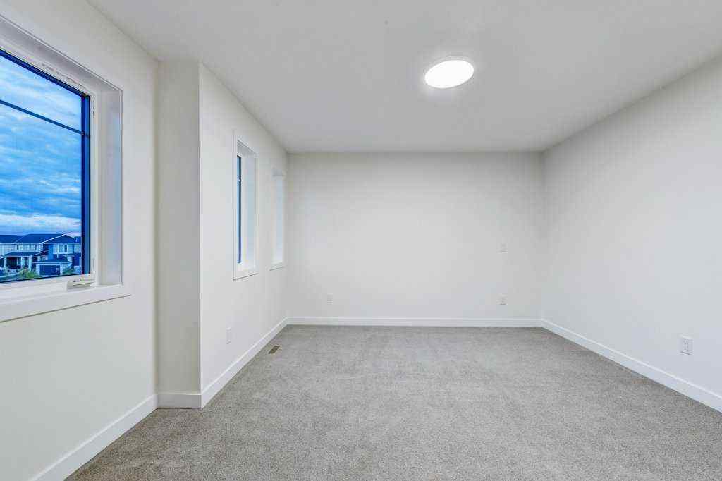 MLS® A2259645 - 891 Langholm Drive SE in Lanark Airdrie, Residential