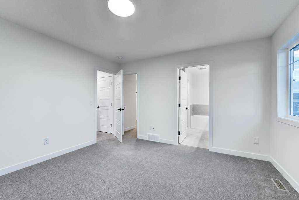 MLS® A2259645 - 891 Langholm Drive SE in Lanark Airdrie, Residential