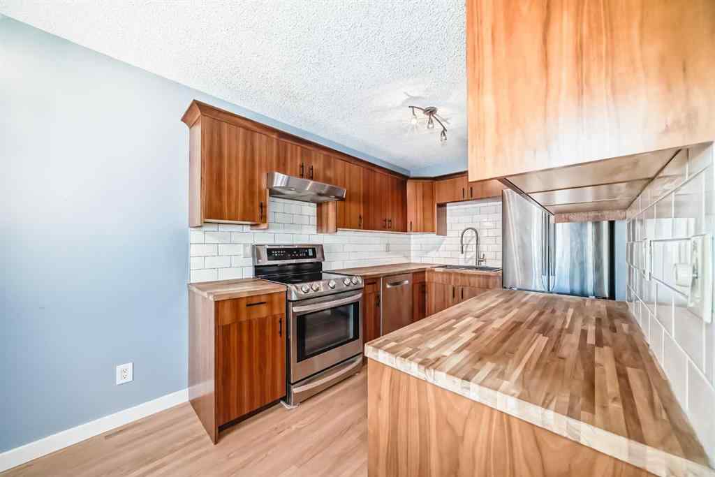 MLS® A2259702 - 42 Pennsburg Way SE in Penbrooke Meadows Calgary, Residential