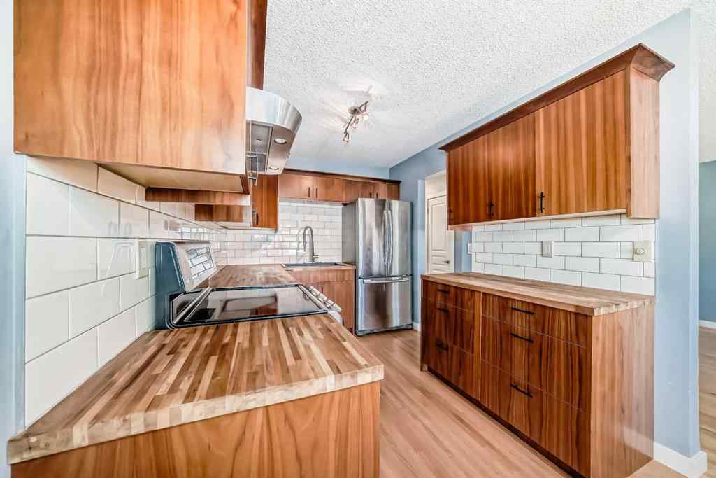 MLS® A2259702 - 42 Pennsburg Way SE in Penbrooke Meadows Calgary, Residential