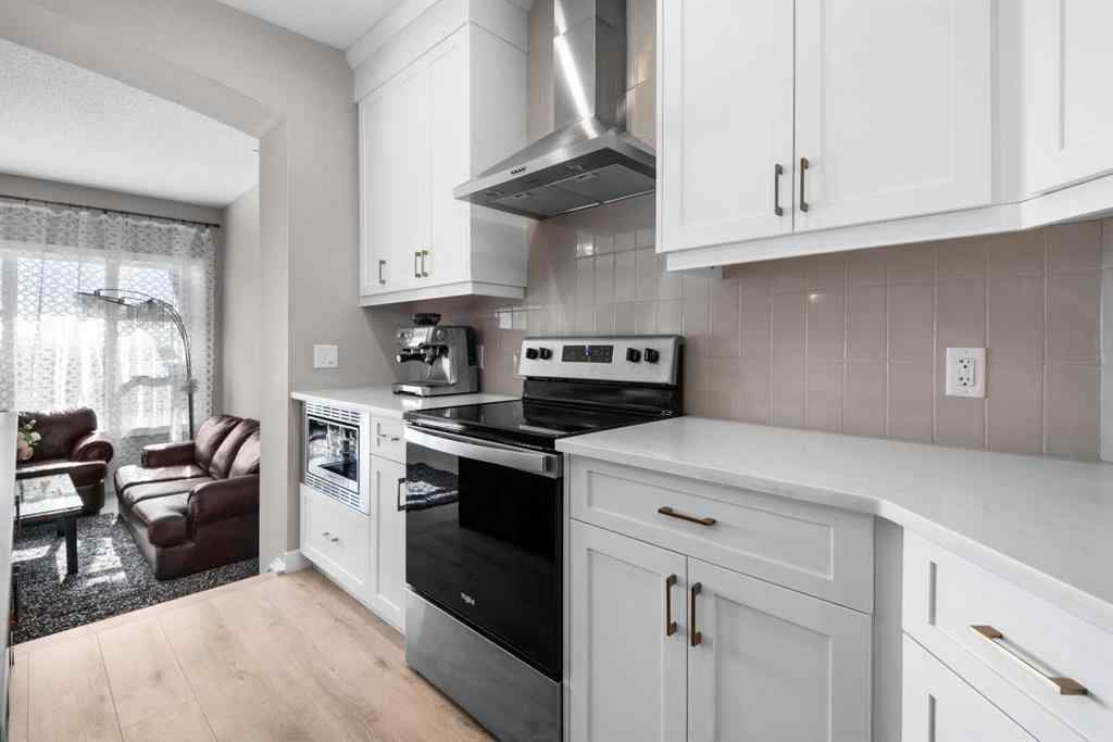 MLS® A2259703 - 44 Calhoun Common NE in Livingston Calgary, Residential